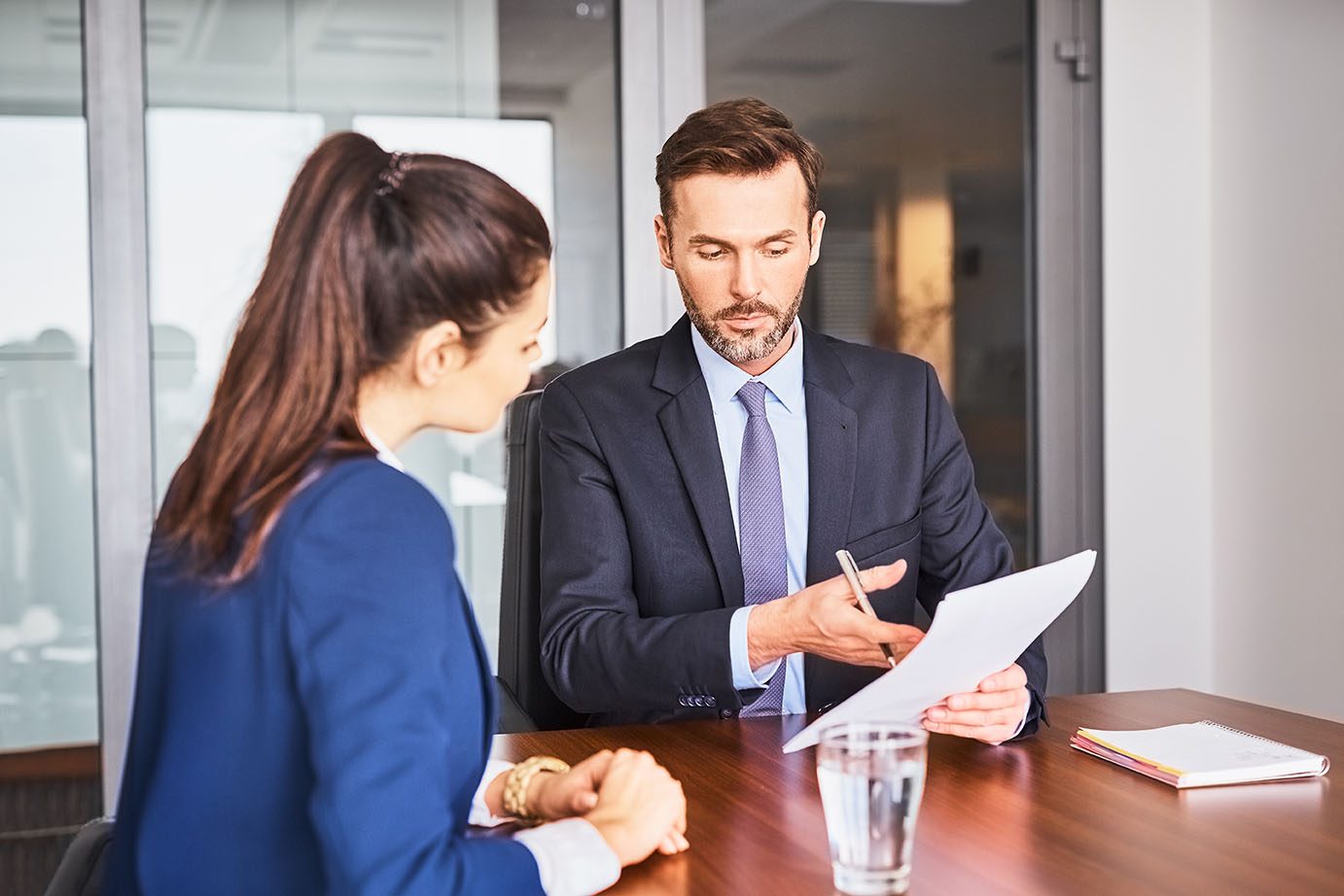 Banking Professional Verifying Documents